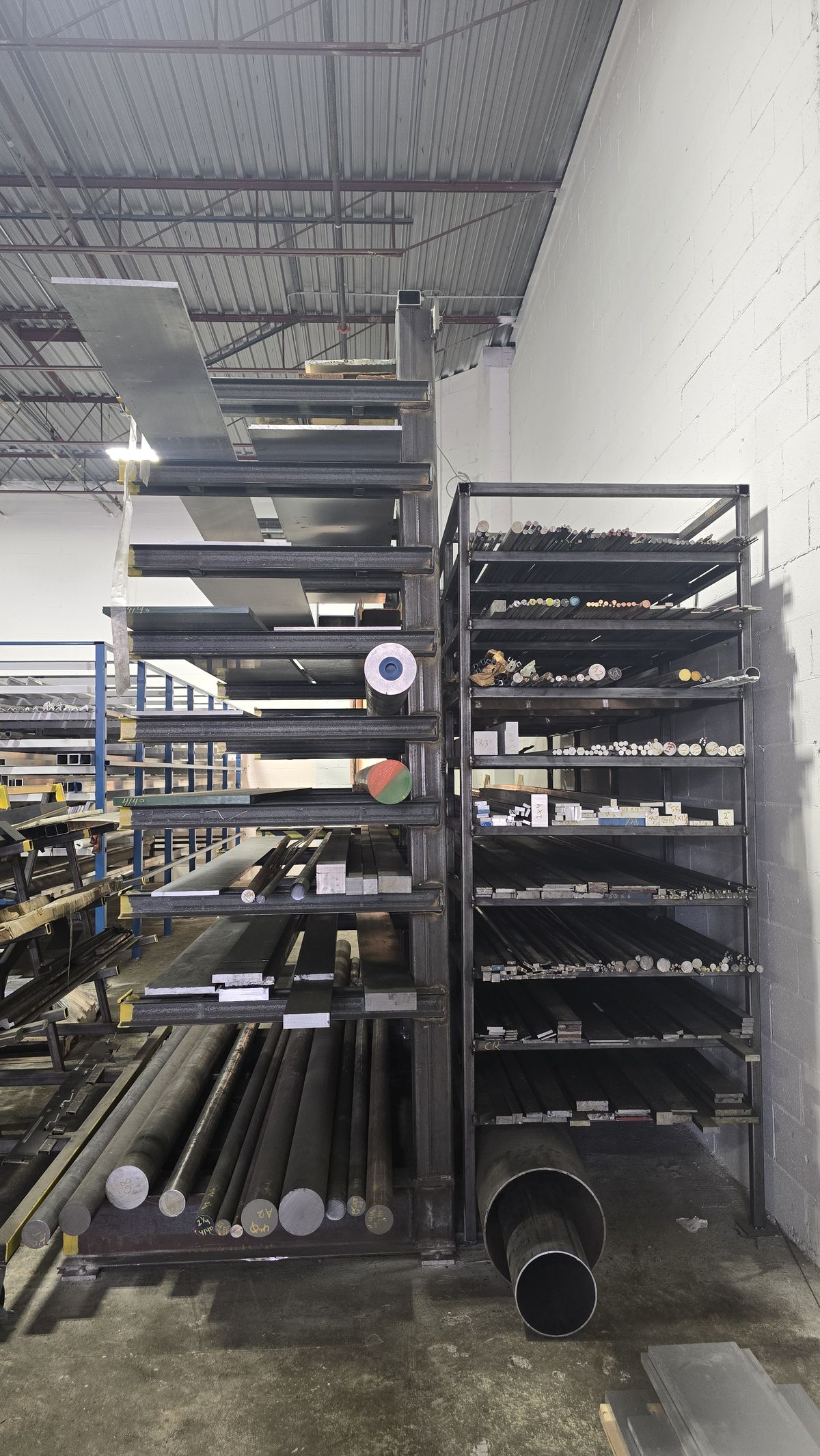 Tube, pipe and angle racks down the aisle