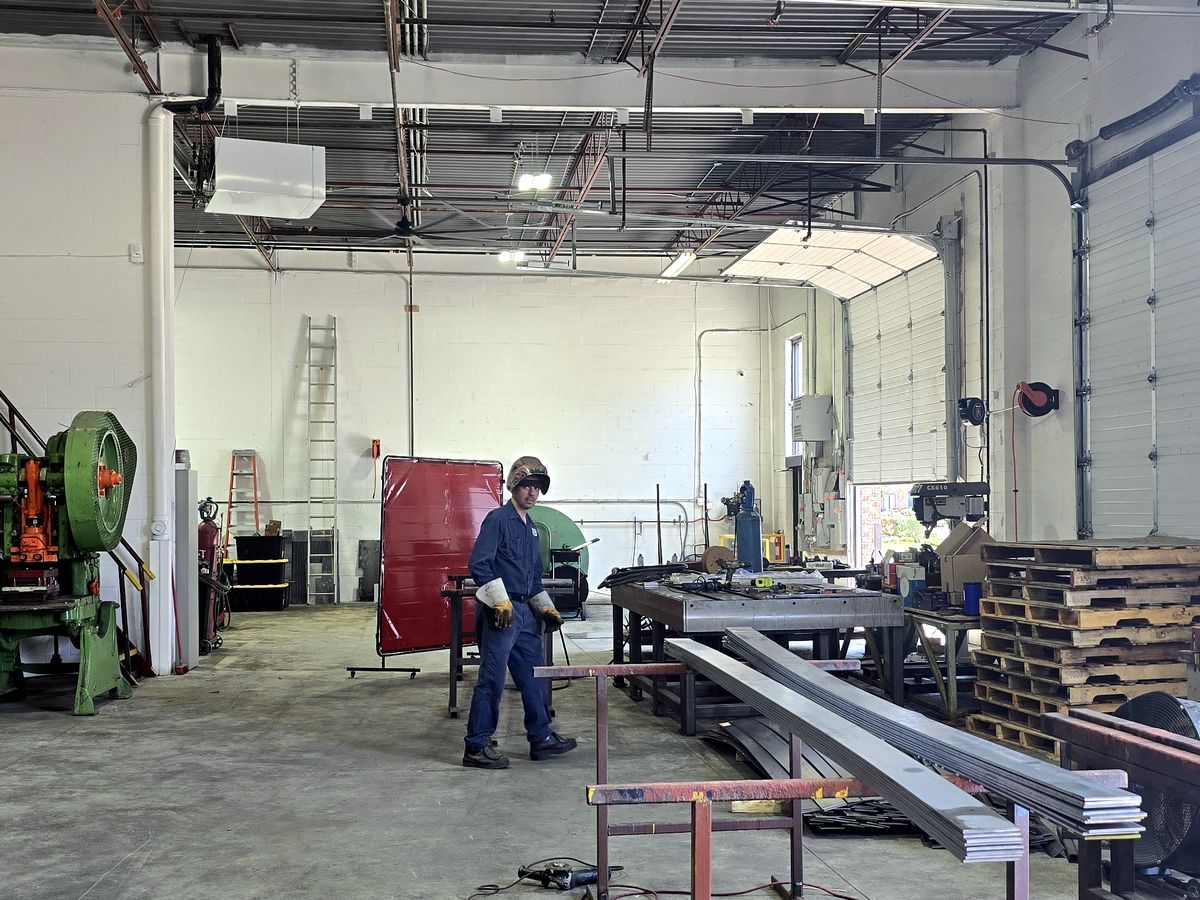 Welder working on the shop floor